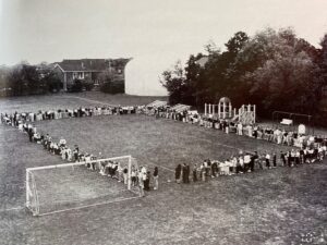 Copy of B 2002 Students outline where new Emmanuel Athletic Facility will go